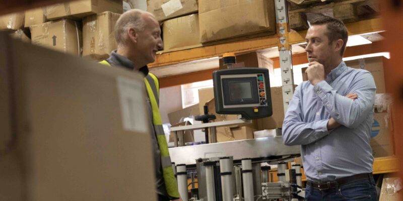 Luke talking in the warehouse